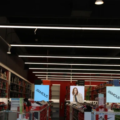 Interior shot of Famous Footwear showing the lighting fixtures.